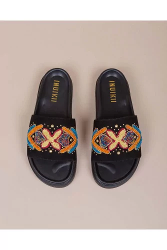 Suede mules with embroidery and African design