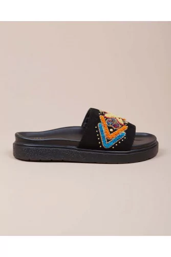 Suede mules with embroidery and African design