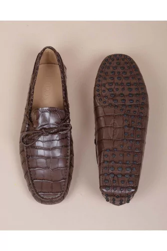 Brown moccasins with crocodile print