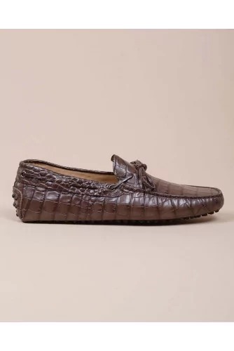 Brown moccasins with crocodile print