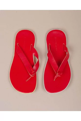 Leather flip flops with white outer sole
