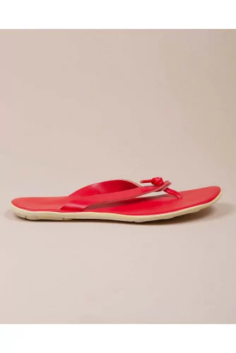 Leather flip flops with white outer sole