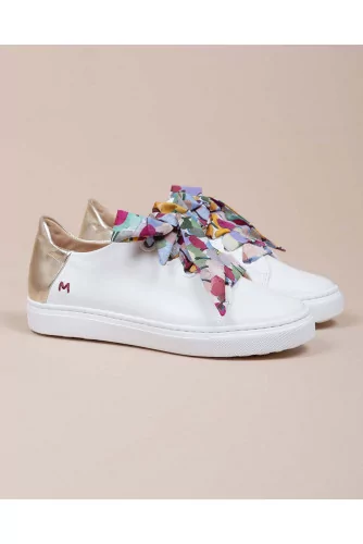 Leather sneakers with floral ribbon and gold buttress