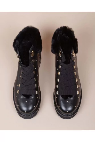 Leather boots with fur inner lining and metal studds