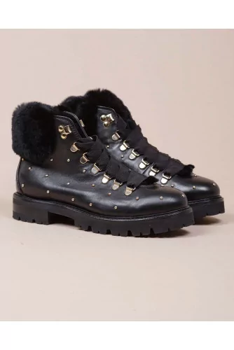 Leather boots with fur inner lining and metal studds