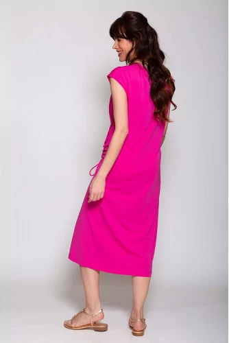 Cotton dress with drapery on the side