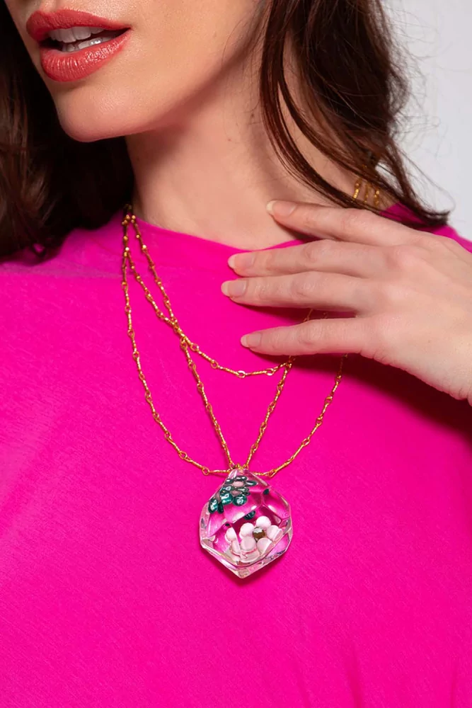 Necklace with pendant and pink flowers