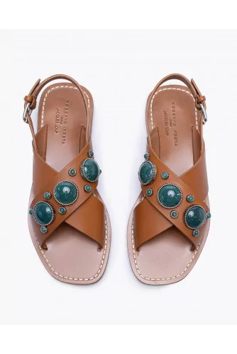 Flat leather sandals decorated with cabochons