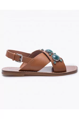 Flat leather sandals decorated with cabochons