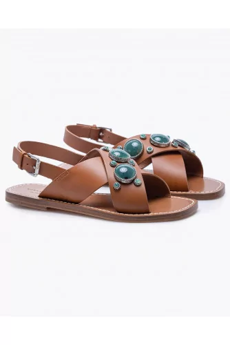 Flat leather sandals decorated with cabochons