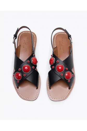 Flat leather sandals decorated with cabochons