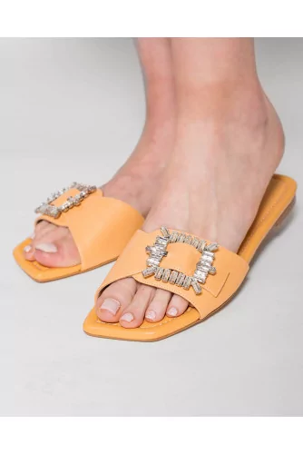 Leather mules with rhinestone buckles