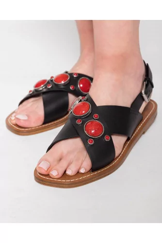 Flat leather sandals decorated with cabochons