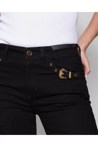 Flare jeans with iconic buckles