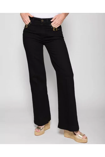 Flare jeans with iconic buckles