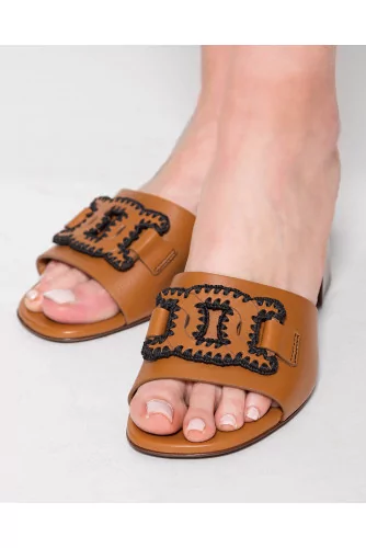 Leather mules with decorative flanges 45