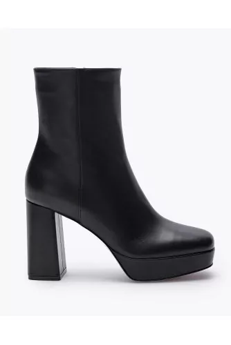 High-heeled leather boots with lightly square-shaped toe 70