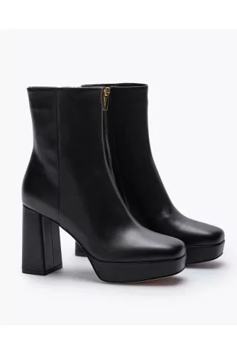 High-heeled leather boots with lightly square-shaped toe 70