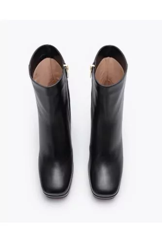 High-heeled leather boots with lightly square-shaped toe 70