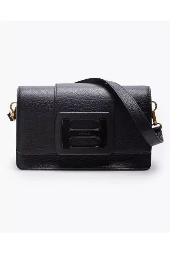 Grained leather handbag with magnetic buckle flap