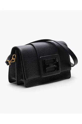 Grained leather handbag with magnetic buckle flap