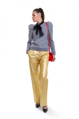 Large straight cut trousers with elastic band around the waist