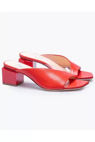 High-heeled leather mules with asymmetrical design 50