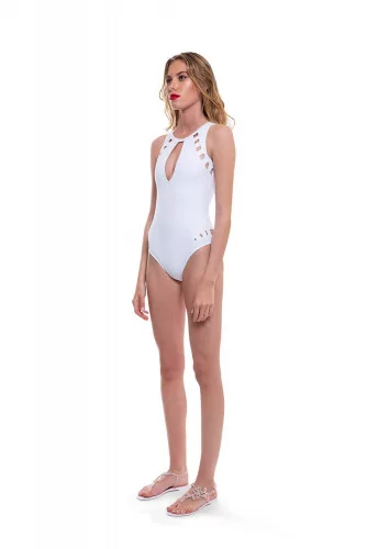 Swimsuit with open back and decorative perforations