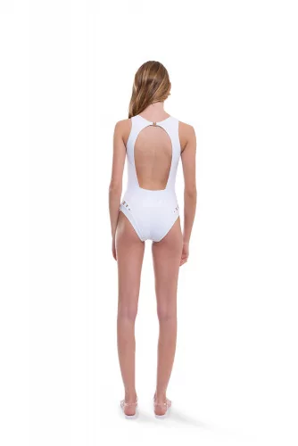 Swimsuit with open back and decorative perforations