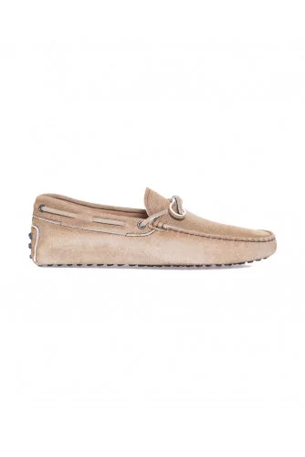 Natural leather moccasins with decorative shoelaces