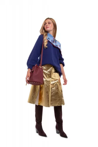 Reversible pleated gold skirt