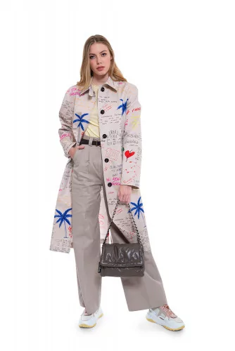 Cotton trench with decorative writing and graffitis