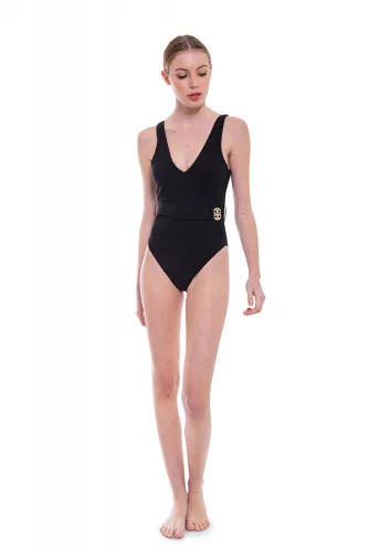 Bathing suit with draped belt and logo closing