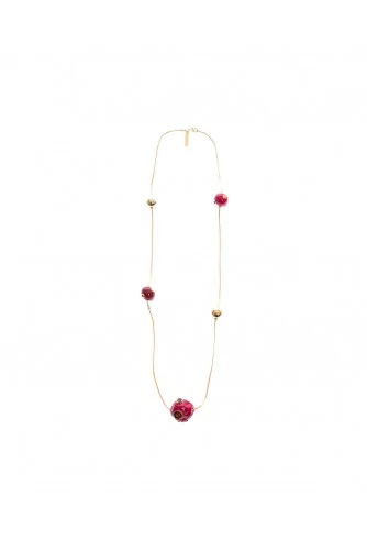 Long gold plated necklace with resin red balls